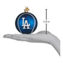 Blue baseball-shaped ornament with LA Dodgers logo on a white hand, showing measurement of 3.25 inches.