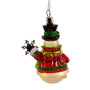 Back view of a lighted glass snowman ornament showing the red coat, green glitter accents, black top hat, and raised snowflake arm.