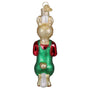Glass ornament of a bear wearing green overalls and a red shirt on a white background