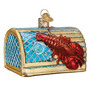 Decorative glass ornament of a lobster tarp on a white background