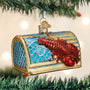 Decorative Christmas ornament of a lobster trap on a tree.