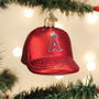 Red glass baseball cap ornament with a Los Angeles A's logo on a Christmas tree