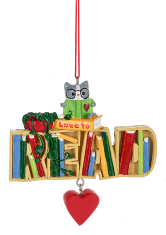 Love to Read ornament shaped like a bookshelf word sign, filled with colorful books, topped with a gray cat in glasses and an apple, with a red heart hanging below.