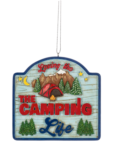 Camping ornament with a blue sign design, red tent, campfire, mountain backdrop, pine trees, moon, and the phrase “Loving the Camping Life.”