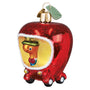 Decorative ornament shaped like a red apple with a small figure inside on a white background
