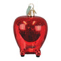 Lowly Worm's Applecar Red glittery glass apple ornament on a white backgroundl