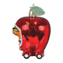 Decorative ornament shaped like a red apple with a small animal inside on a white background