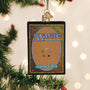 Decorative ornament resembling a 'Magic: The Gathering' card hanging on a Christmas tree.