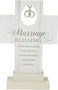 White freestanding cross with silver intertwined rings and the words “Marriage Blessing” above a printed blessing for a couple.