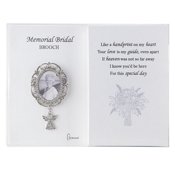 Memorial bridal brooch with an ornate silver-tone oval photo frame, small angel charm, and presentation gift box featuring a sympathy poem for weddings.