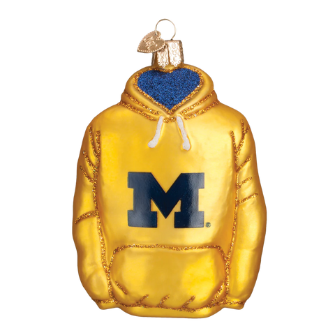 Glass ornament of a yellow Michigan hoodie with a blue 'M' on a white background