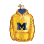 Glass ornament of a yellow Michigan hoodie with a blue 'M' on a white background