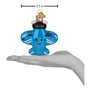 Blue glass Misfit Plane ornament held in a hand with measurement label