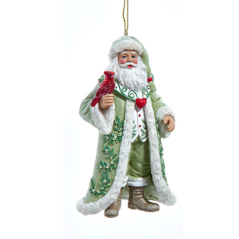 Decorative Christmas ornament of a Santa Claus figure in a green coat with red accents on a white background.