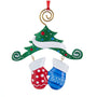 Christmas ornament with a tree, red and blue mitten-shaped boots on a white background