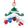 Decorative Christmas ornament with mittens and a tree on a white background