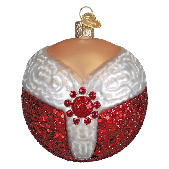 Decorative ornament resembling Mrs. Claus outfit round bulb on a white background