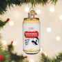 Old World Christmas National Bohemian beer can ornament hanging on a Christmas tree with warm lights in the background.