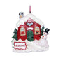 Personalized New Home Snowy Cottage Ornament with red cottage, green door, snowy roof, snowman, and New Home sign.