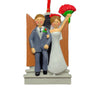 Wedding Ornament with Bride and Groom at Chapel Door - bride holding up red rose bouquet