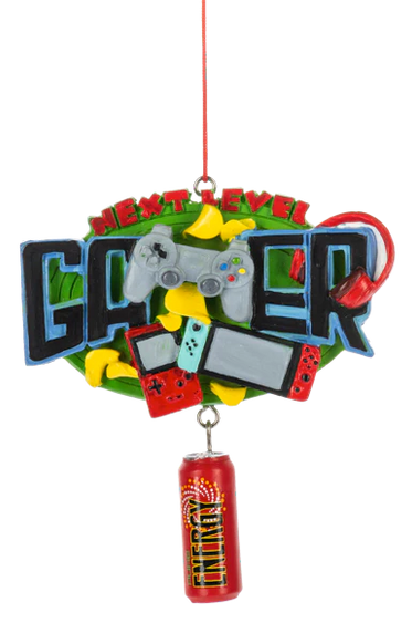 Next Level Gamer ornament featuring bold gamer lettering, video game controllers, a handheld console, a headset, and a dangling energy drink can.