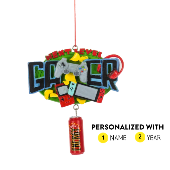 Personalized gamer ornament with video game controllers, handheld console, headphones, and energy drink, personalized with name and year.