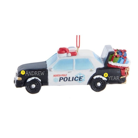 Personalized North Pole Police car ornament with a name on the front hood area and a year on the back side of the car.