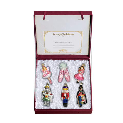 Set of Nutcracker Suite Christmas ornaments in a decorative box.