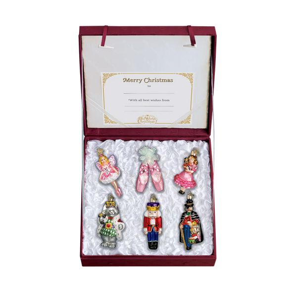 Set of Nutcracker Suite Christmas ornaments in a decorative box.