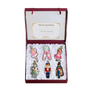 Set of Nutcracker Suite Christmas ornaments in a decorative box.