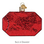 Red glittery Oh Fudge Soap rectangular ornament with a gold tag on a white background back view