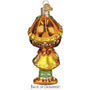 Glass ornament of Orange Blossom with a yellow dress and brown hair on a white background back view