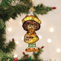 Glass ornament shaped like Orange Blossom in a yellow dress and brown hat hanging on a Christmas tree.