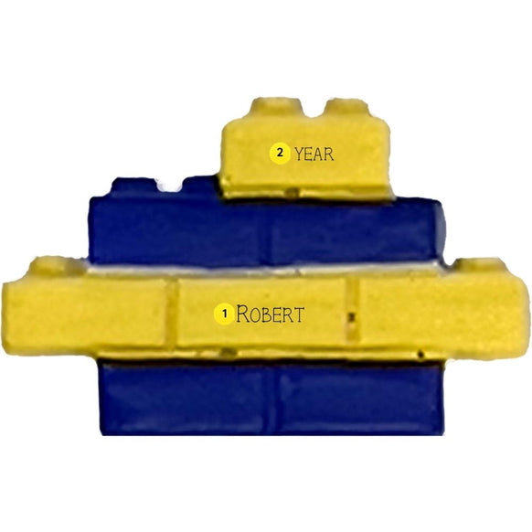Personalized toy blocks ornament with stacked yellow and blue building blocks.