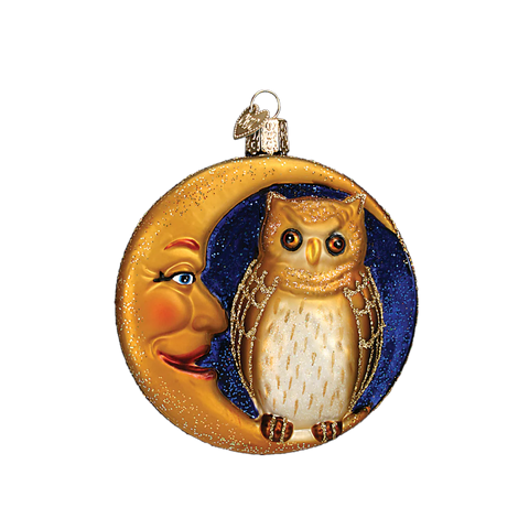Decorative ornament with an owl and moon design on a white background