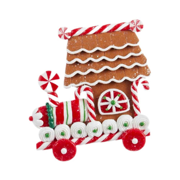 Gingerbread locomotive ornament with piped white icing, peppermint swirl accents, candy cane trim, and red wheels.