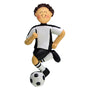 Soccer player figurine in black and white uniform with a soccer ball on a white background