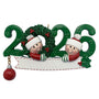 Christmas ornament with two children holding a wreath and the year 2026.