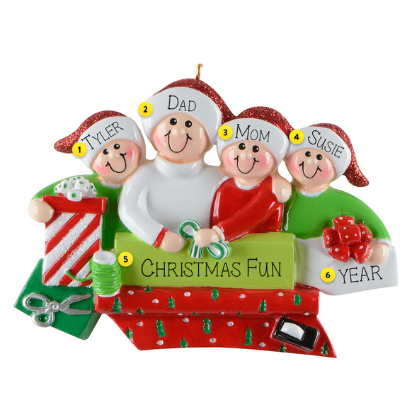 Personalized family Christmas ornament with four family members and festive items.