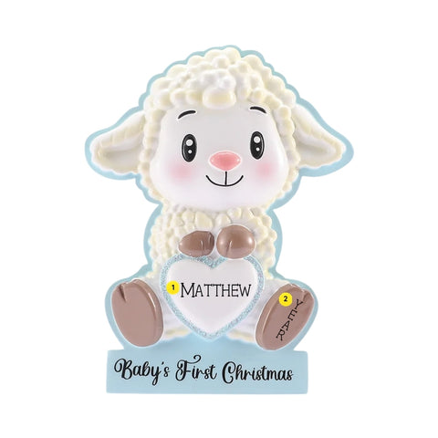 Personalized baby’s first Christmas lamb ornament in blue with a name on the heart and year on the lamb’s foot.