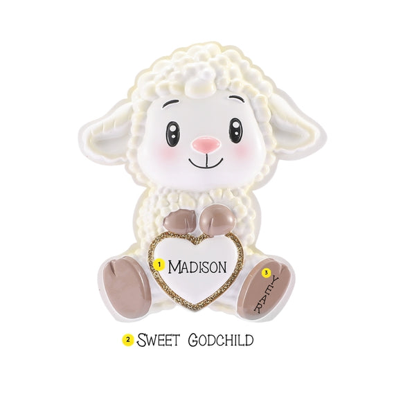 Personalized baby godchild lamb ornament with a name on the heart, with an example of “Sweet Godchild” on the base, and year on the lamb’s foot.