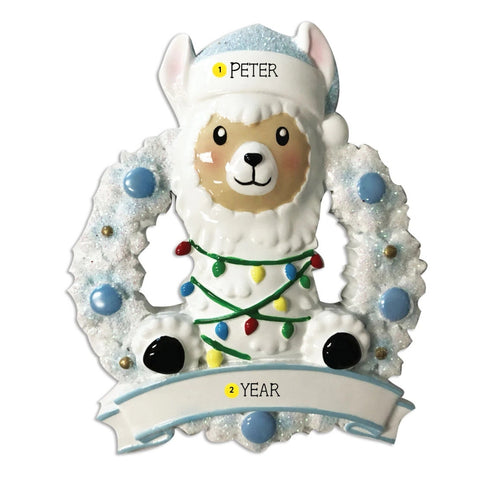 Baby llama ornament personalizing example with name on blue Santa hat and year on front banner