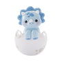 Blue baby triceratops ornament sitting in a cracked white egg with soft blue accents and a sweet face.