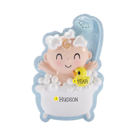 Personalized baby in bubble bath ornament with blue glitter border, personalized with an example name and year on the yellow rubber duck