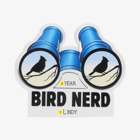Personalized birding ornament with a name below the “Bird Nerd” lettering and the year on the binoculars.