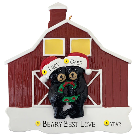 Black bear couple with Christmas hats and wreath in front of a red barn, personalized ornament.
