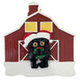 Black bear couple wearing a Santa hat and holding a wreath in front of a red barn ornament.