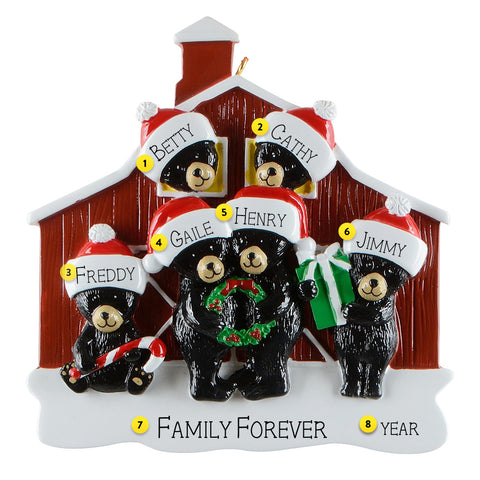 Personalized Christmas ornament with 6 black bears in front of a red barn, each bear wearing a Santa hat with a name.