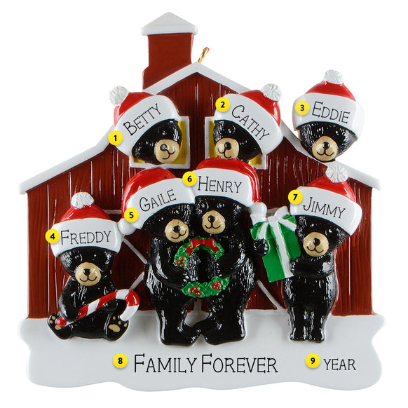 Personalized Christmas ornament with 7 black bears wearing hats and scarves in front of a red barn.
