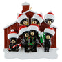 Christmas ornament with 7 black bears wearing Santa hats and a red barn in the background